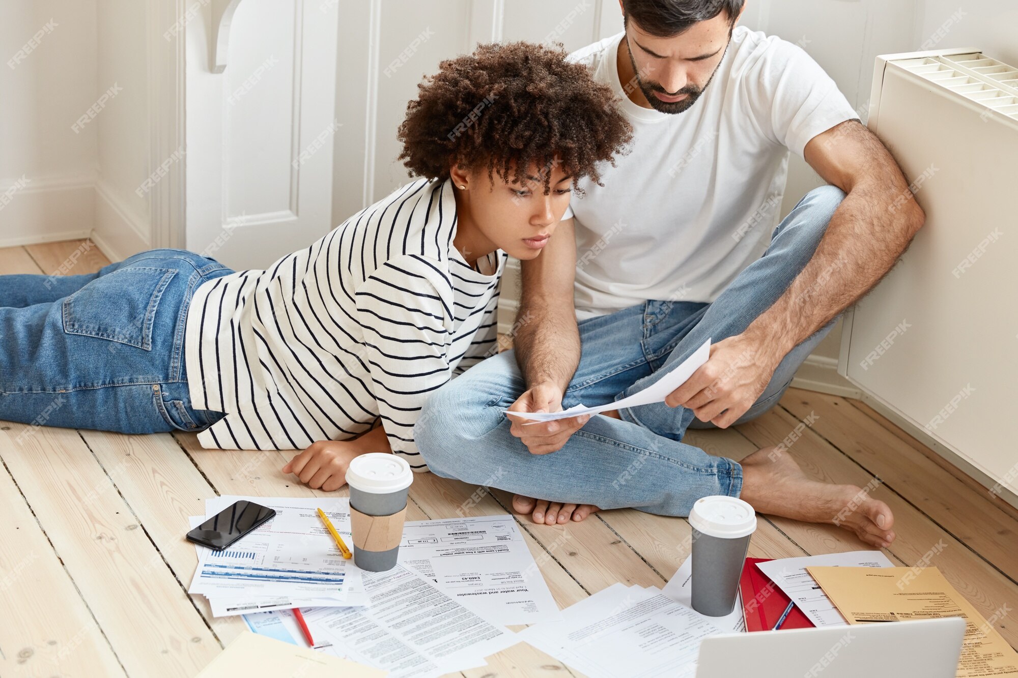 Tax Considerations When Selling a Home family couple maintains home accounting discuss plans and future payments